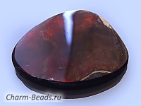 Кабошон ископаемого перламутра (аммолита) на подложке.