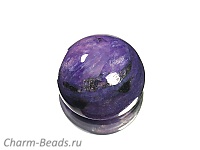 Кабошон чароита. Россия. Погрешность измерения 0, 5 - 1 мм. Мелкие выемки с обратной стороны