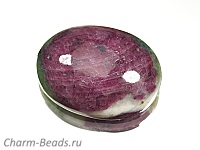 Кабошон корунда с цоизитом. Место добычи - Бразилия. Мелкие выемки. Погрешность измерения 0,5 - 1 мм.