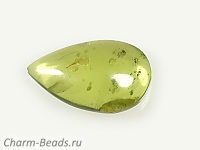 Кабошон оливина (перидота). Бразилия. Погрешность измерения 0,5 мм.