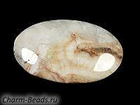 Кабошон барита. Погрешность измерения в пределах 0,5 - 2 мм. Мелкие выемки.