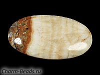 Кабошон барита. Погрешность измерения в пределах 0,5 - 2 мм. Мелкие выемки.