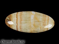 Кабошон барита. Погрешность измерения в пределах 0,5 - 2 мм. Мелкие выемки.