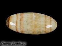 Кабошон барита. Погрешность измерения в пределах 0,5 - 2 мм. Мелкие выемки.