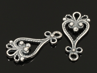 Коннектор для создания украшений. Основа - латунь, покрытие серебро 925 пробы с оксидированием. Диаметр отверстий 1.5 мм. Цена указана за 1 штуку. 